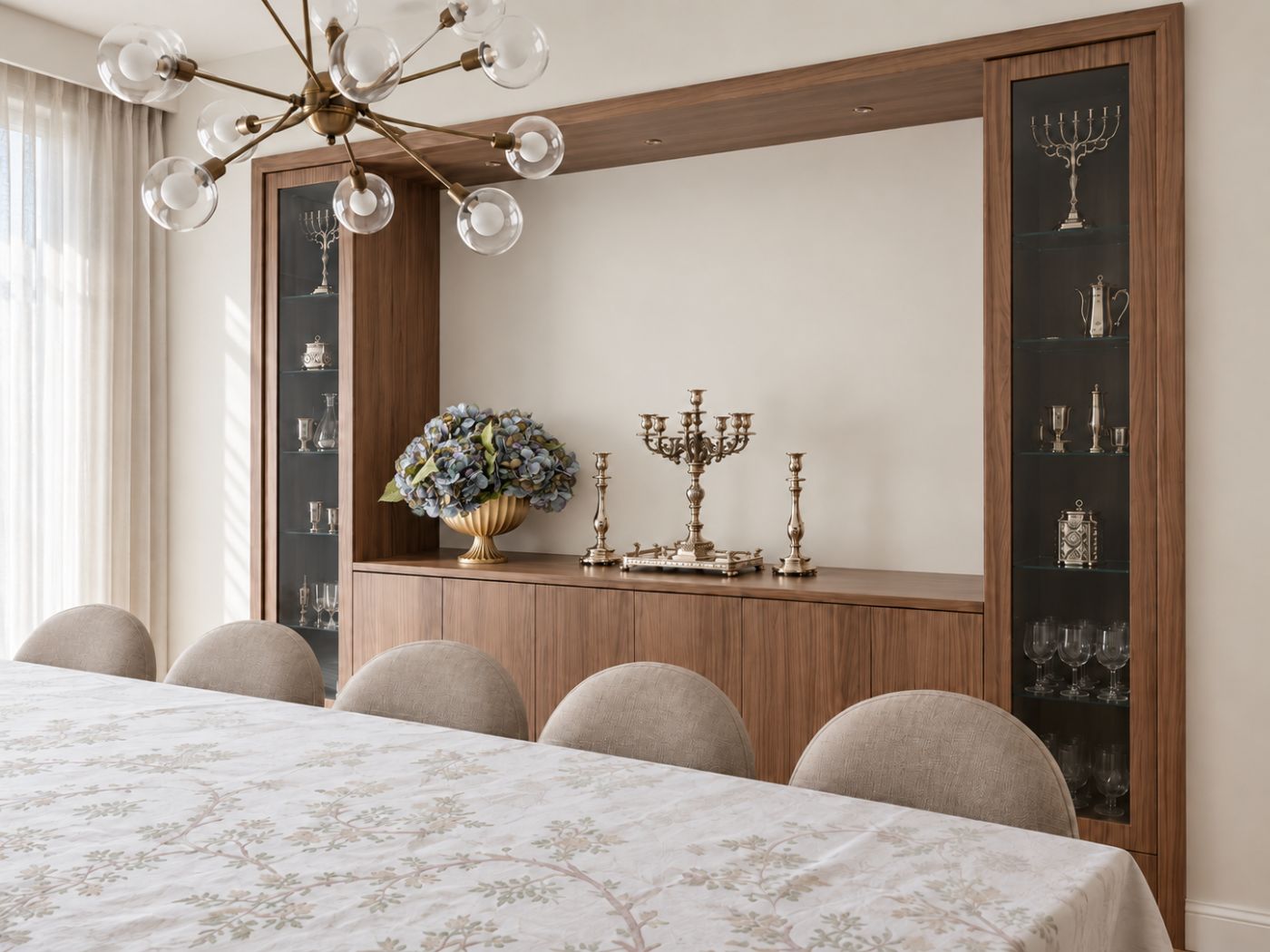 Walnut dining room breakfront with lit glass display cabinets